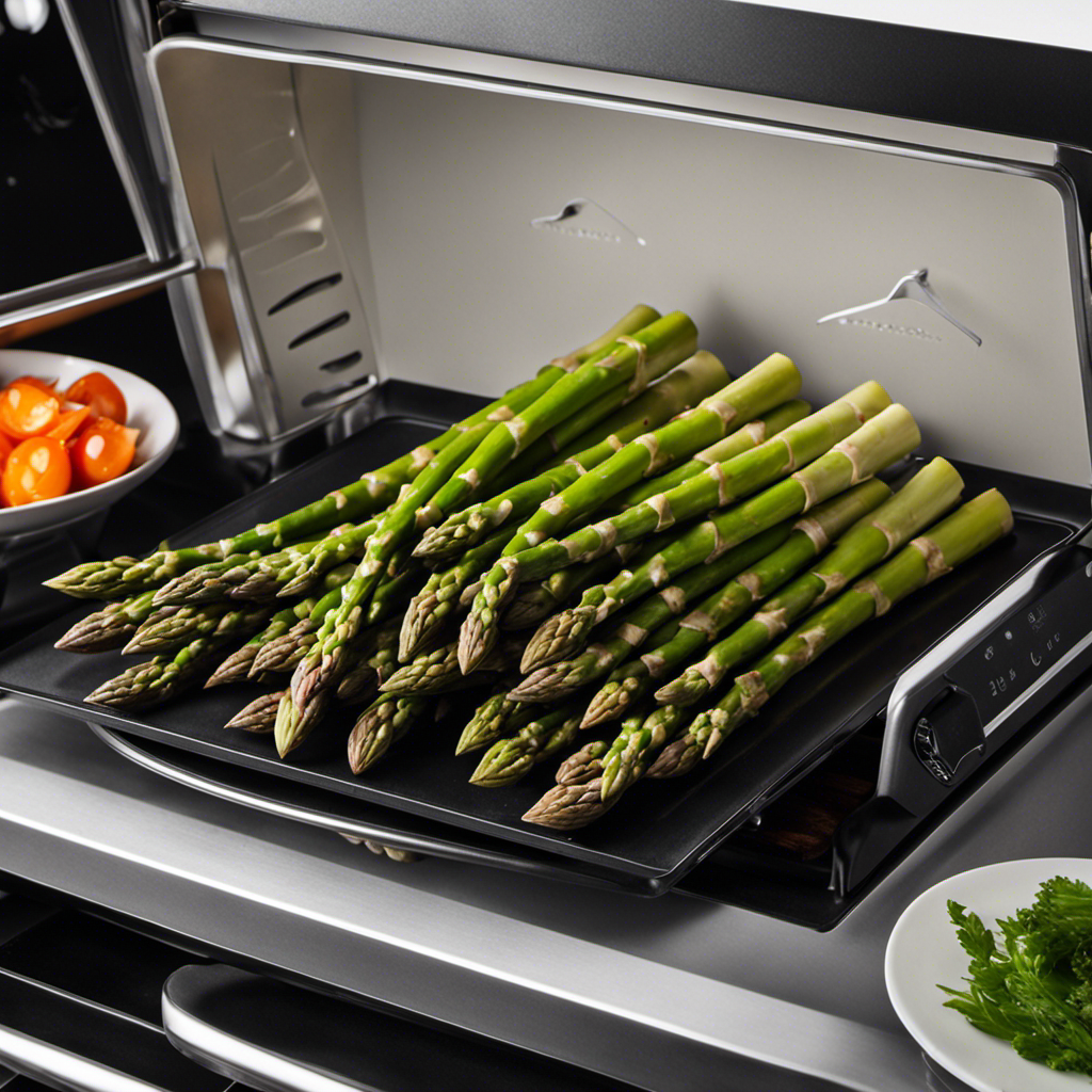 An image of a modern oven with a digital display, set to 400°F, as a tray of fresh asparagus lays beside it