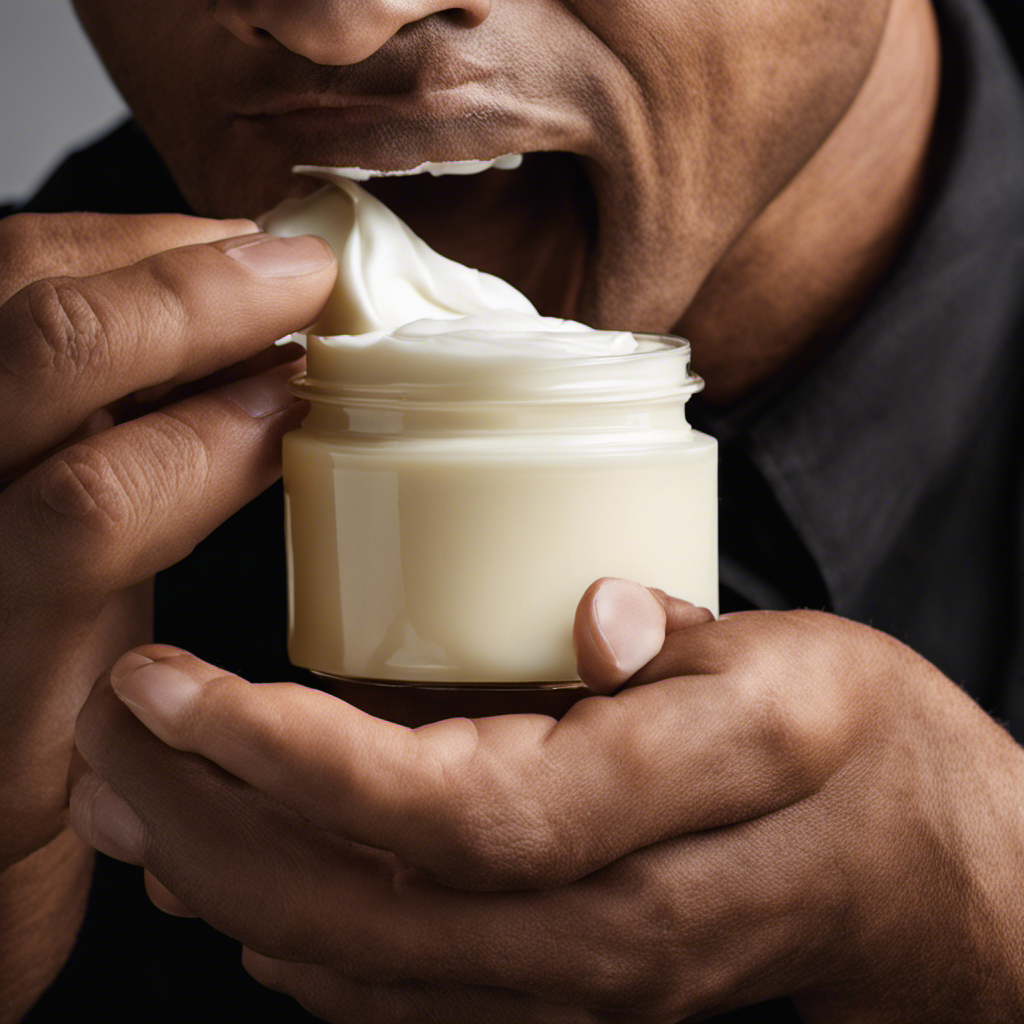 An image of a man's hand holding a jar of shave butter, with a dollop of creamy, white shave butter being gently spread onto his clean-shaven cheek, revealing a smooth, moisturized skin underneath